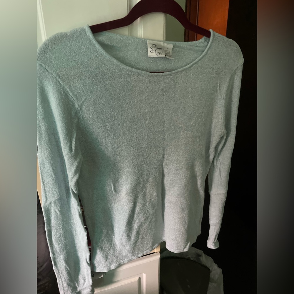 Two lightweight soft fuzzy sweaters size small one light blue one light pink